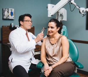 Dr. Goco Examining a Female Patient