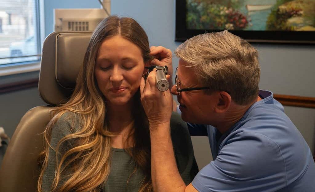 Dr Fordice examining patient ear